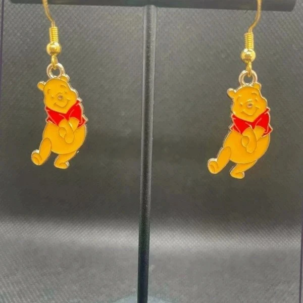 Boucles d’oreilles plaque or neuves jamais portees fantasy winny l ourson